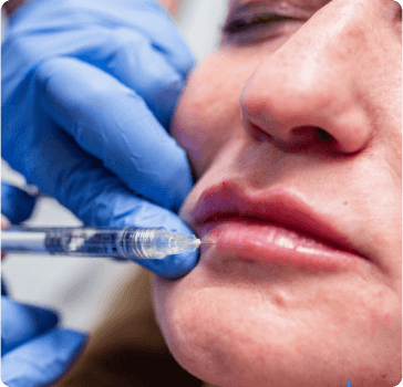 Woman getting a lip injection