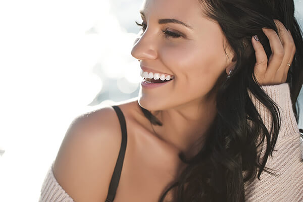 Woman smiling after PRP Orgasm shot at Bare Medical Spa and Laser Center